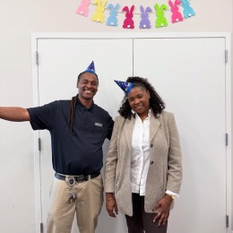 a man and a woman posing for a picture