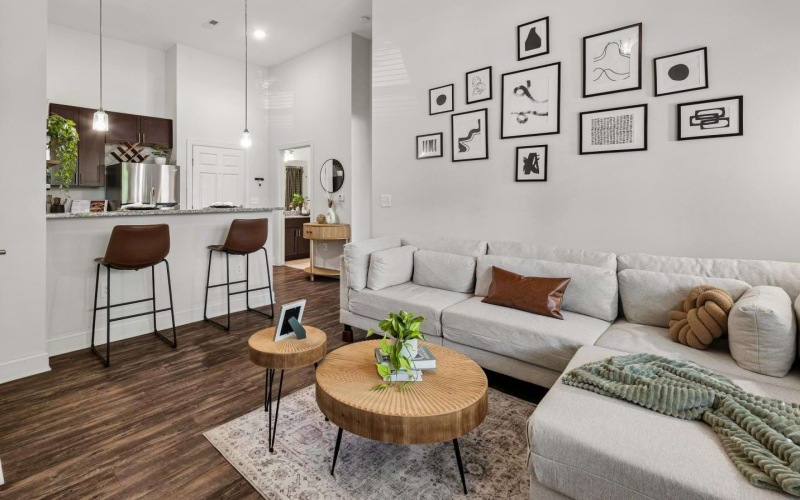 a living room with a couch and a table